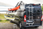 Droprack Tall van Edition being lowered to access kayaks on a Fiat Ducato