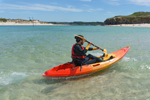 Kayaking along the beach with the Wave Sport Scooter X Sit On Kayak